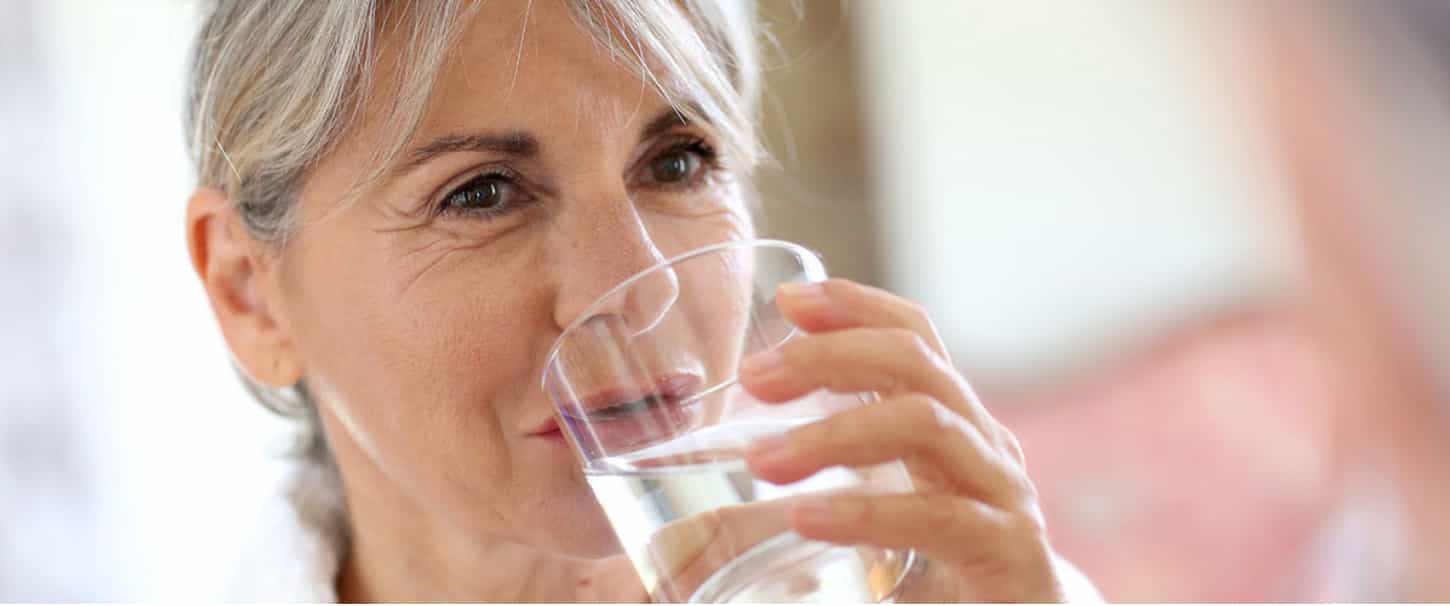 Woman Drinking a Glass of Water