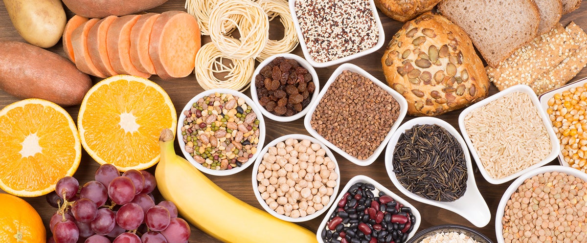 Carbohydrates food sources, top view on a table