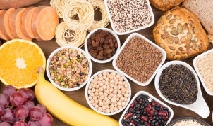 Carbohydrates food sources, top view on a table