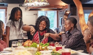 African American Preparing Thanksgiving Dinner