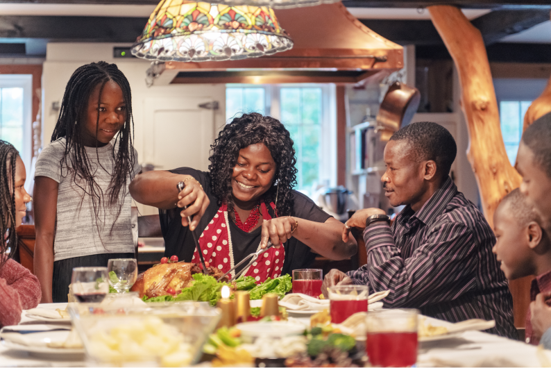 African American Preparing Thanksgiving Dinner